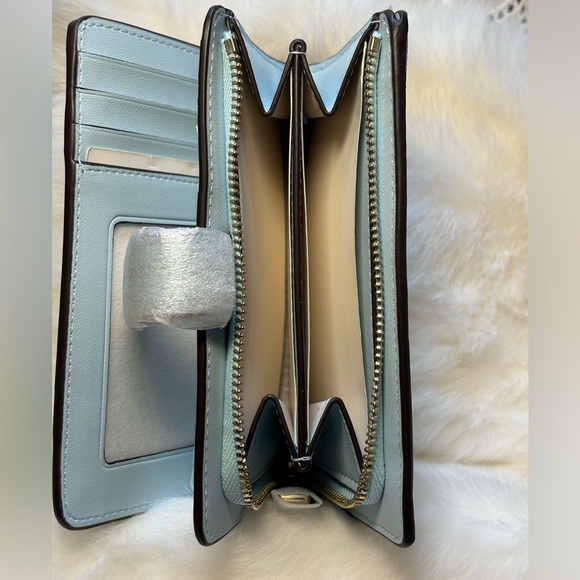 Kate Spade wallet- spade flower pvc color blue glow with gold accents. - Picture 7 of 8